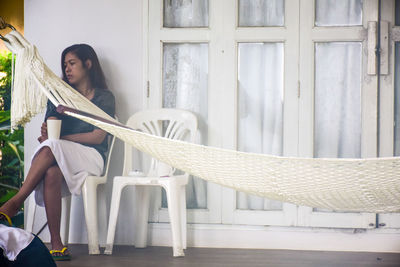 Woman sitting on chair