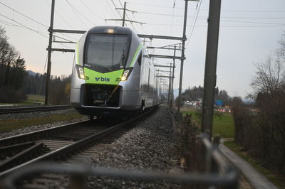 Train on railroad track against sky