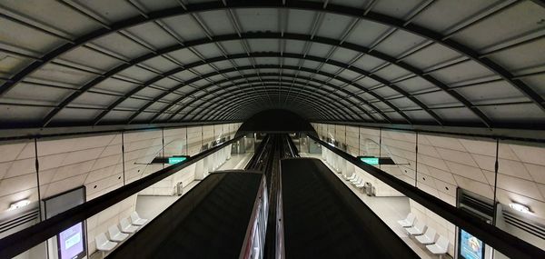 Low angle view of escalator in subway station