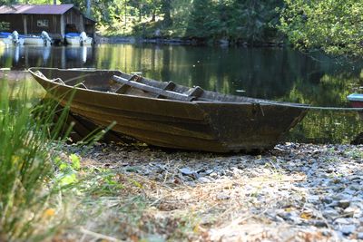 Boats moored in lake