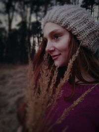 Portrait of smiling woman in snow