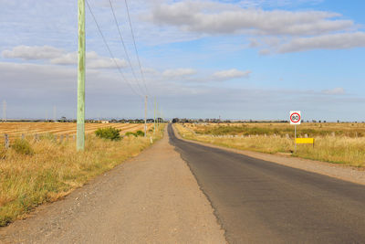 Empty road against sky