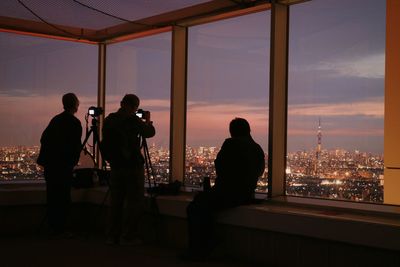 Silhouette of woman in dark background