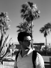 Portrait of young man wearing sunglasses outdoors