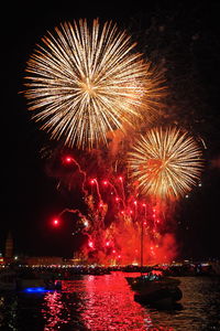 Firework display at night