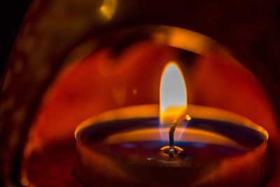 Close-up of lit candle
