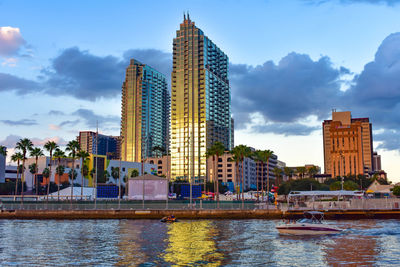 Tampa museum of art, colorful buildings, a riverwalk, and hillsborough river in the downtown area.