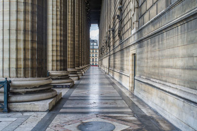 Colonnade by corridor in building