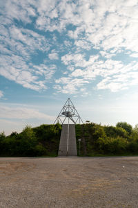 Pyramid, metal construction on a mountain.