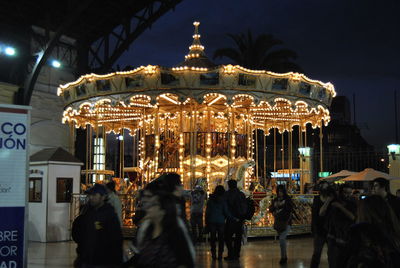 Tourists at night