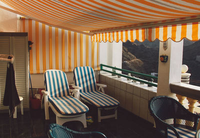 Empty chairs and table at home
