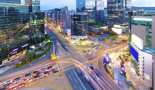 High angle view of light trails on city street at night