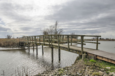 Bridge across a canal in dutch nature reserve