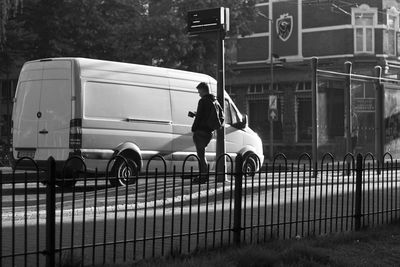 Man walking on street in city