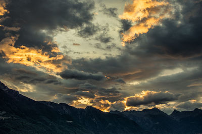 Scenic view of dramatic sky during sunset