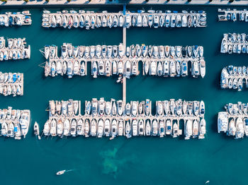 Aerial view of boats moored at harbor