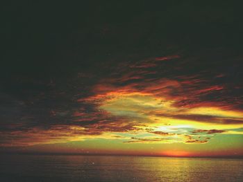 Scenic view of sea against sky at sunset