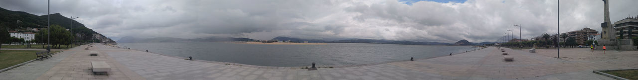 PANORAMIC VIEW OF BUILDINGS AGAINST SKY