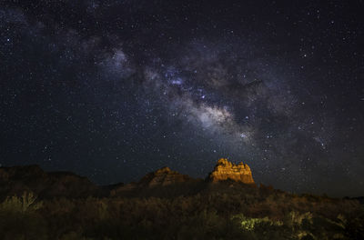 Scenic view of star field against sky at night