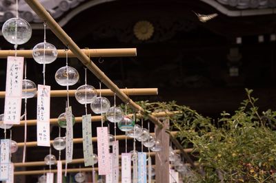 Close-up of cross hanging in temple