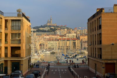 Buildings in city against sky