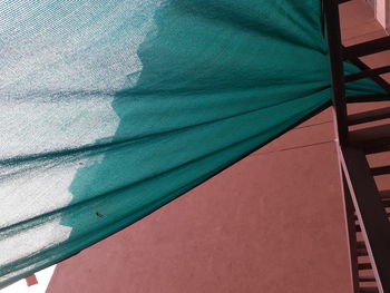 Low angle view of shadow on wall