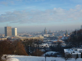 Buildings in city during winter