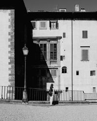 Woman walking on city street