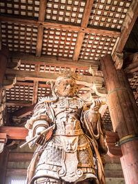 Low angle view of buddha statue