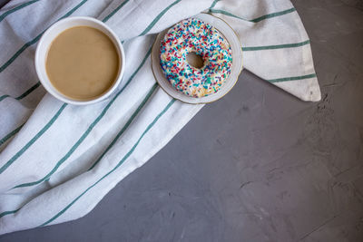 High angle view of coffee cup on table