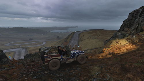 Panoramic view of road and land against sky