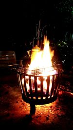 Close-up of illuminated fire at night