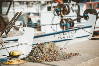 Close-up of fishing boats moored at harbor