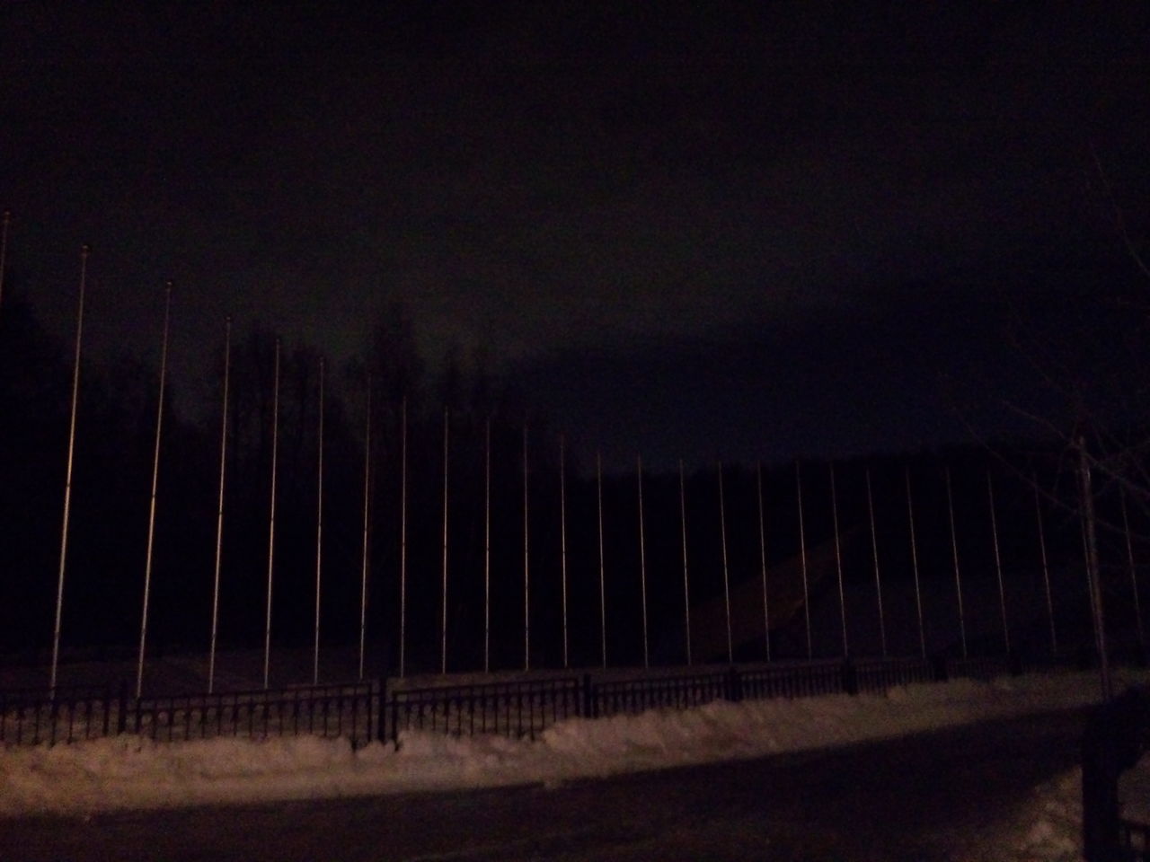 night, sky, fence, road, in a row, illuminated, field, landscape, tranquility, outdoors, dusk, no people, tranquil scene, nature, street, street light, empty, transportation, copy space, grass