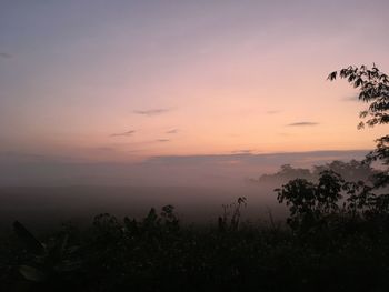 Scenic view of silhouette landscape against sky during sunset