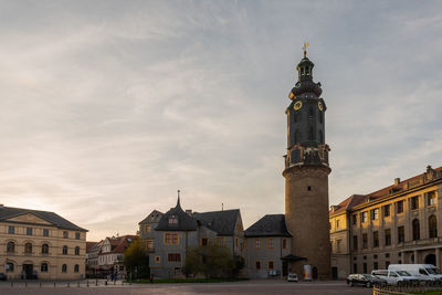 View of buildings in city against sky