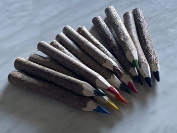 High angle view of colored pencils on table