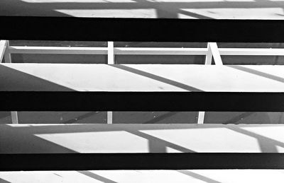 Close-up of shadow on tiled floor