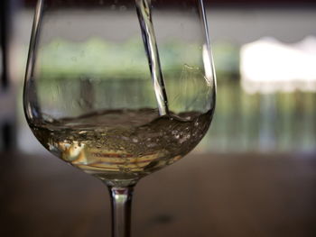 Close-up of wine glass on table