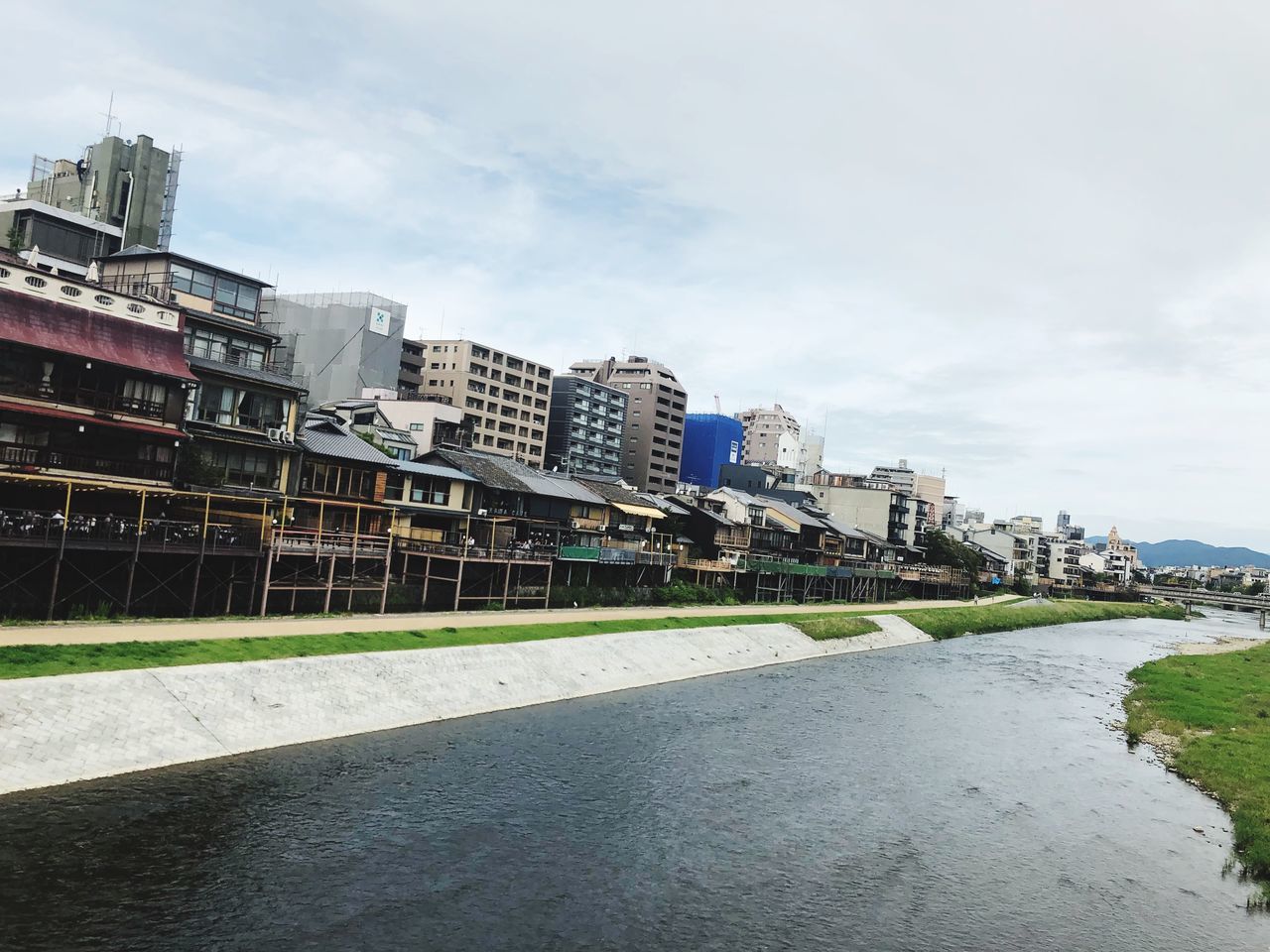 architecture, building exterior, built structure, sky, cloud - sky, city, water, day, nature, building, no people, outdoors, waterfront, industry, travel, landscape, cityscape, travel destinations, transportation