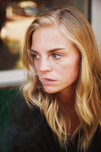 Close-up of smoking young woman