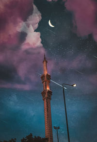 Low angle view of street light against sky at night
