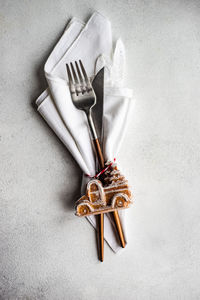 Directly above shot of fork and napkin on table