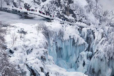 Scenic view of snowcapped mountains during winter