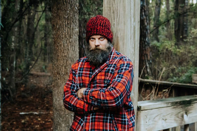 Portrait of man with beard in plaid.