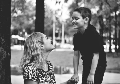 Young woman with son at park