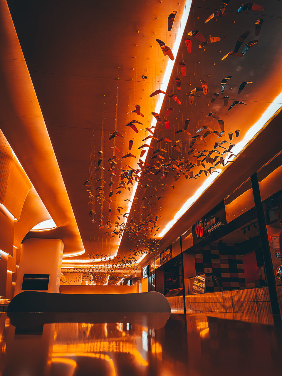 LOW ANGLE VIEW OF ILLUMINATED CEILING