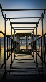 Empty railway bridge against clear sky