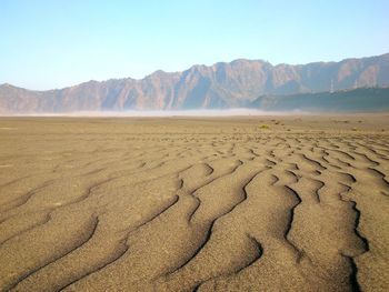 Scenic view of desert against sky