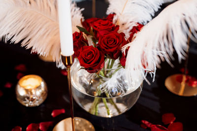 Close-up of rose bouquet on glass table